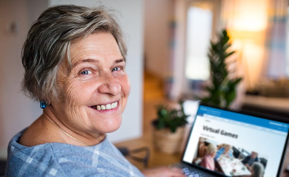 VirtualGames Woman playing virtual game on laptop